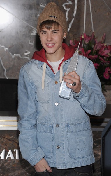 3-Justin Bieber lights the The Empire State Building on November 18, 2011 in New York City. Justin Bieber lights the The Empire State Building on November 18, 2011 in New York City.